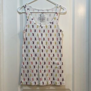 Pineapple tank XL. I believe it’s girls XL so more a women’s S/M